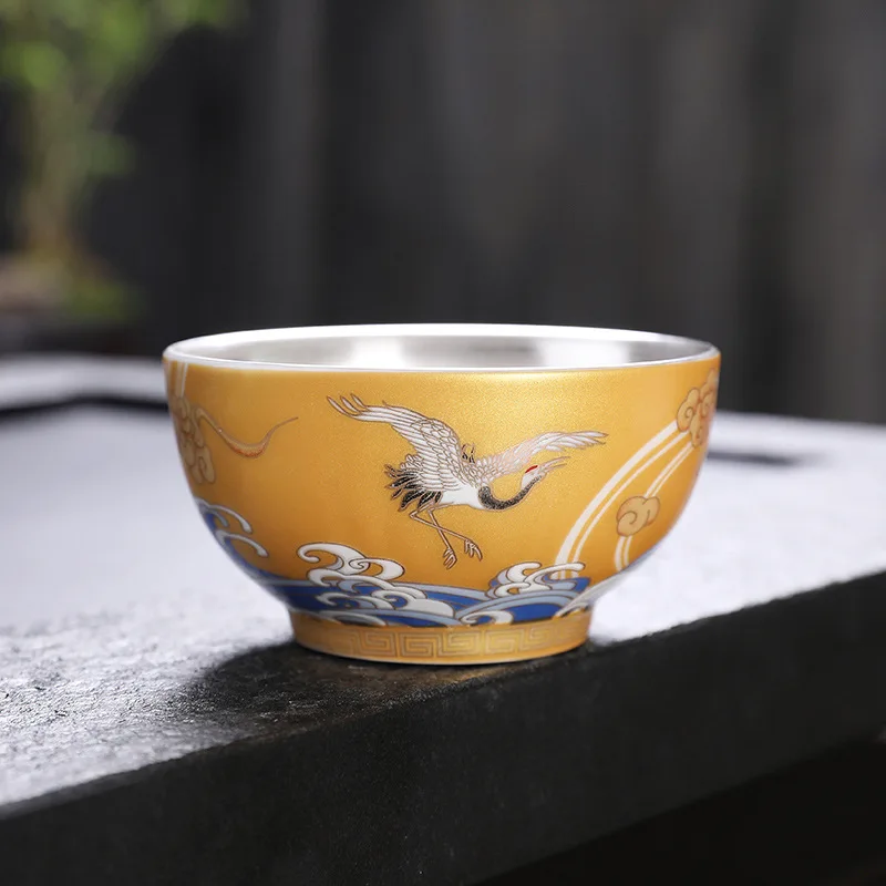 

Pure handmade porcelain wrapped silver tea cup 999 sterling silver inner liner master cup Kung Fu tea cup inlaid with silver tea