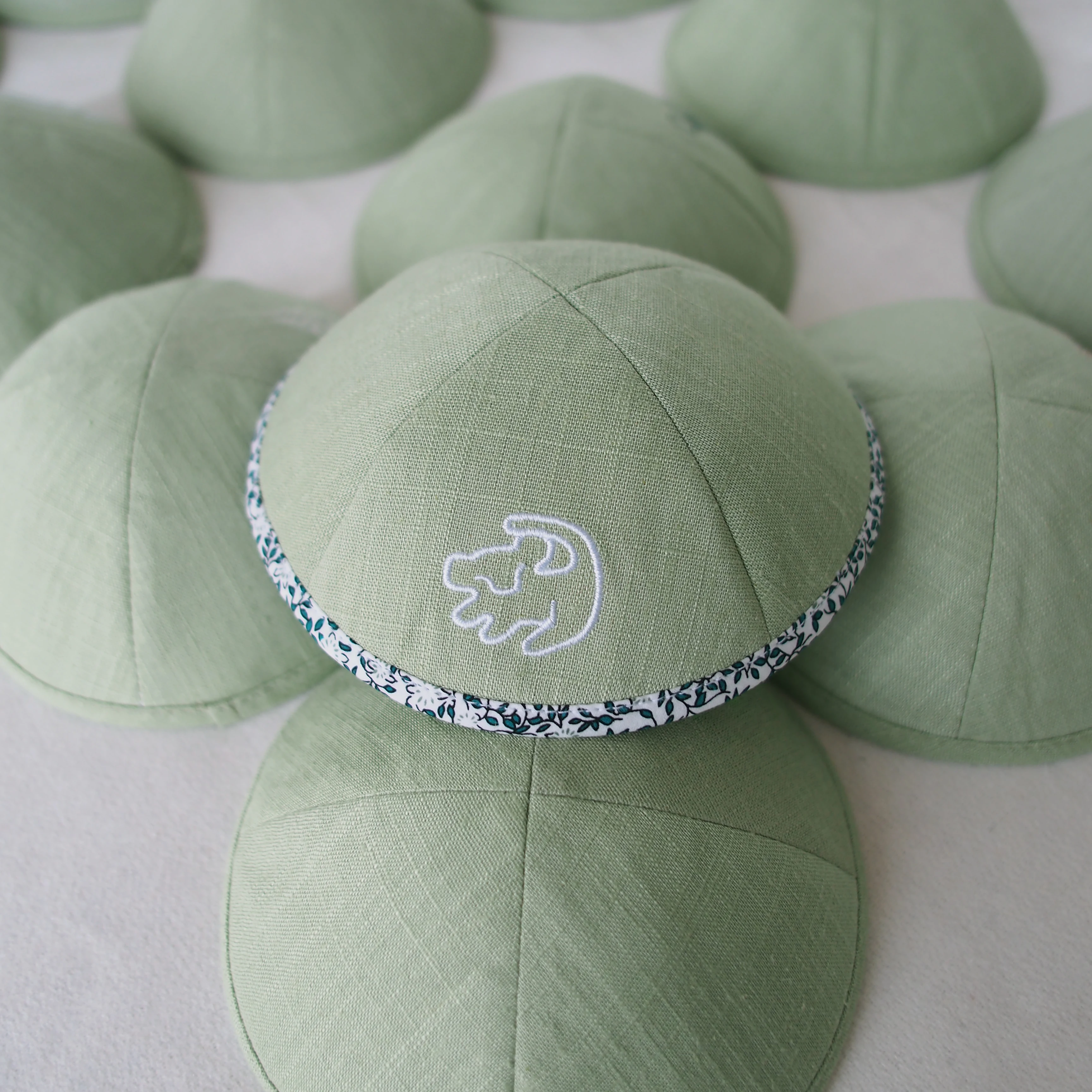 

Light green custom-edged cat embroidery linen kippah Jewish Ahava wedding and barbat mitzvah custom kippot Jewish gift yarmulke