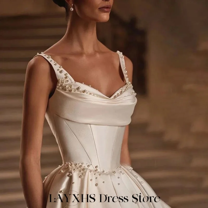 LAYXHS فساتين زفاف كريمة السباغيتي الأشرطة اللؤلؤ ألف خط الطية الطابق زي العرائس مخصص رداء دي ماري