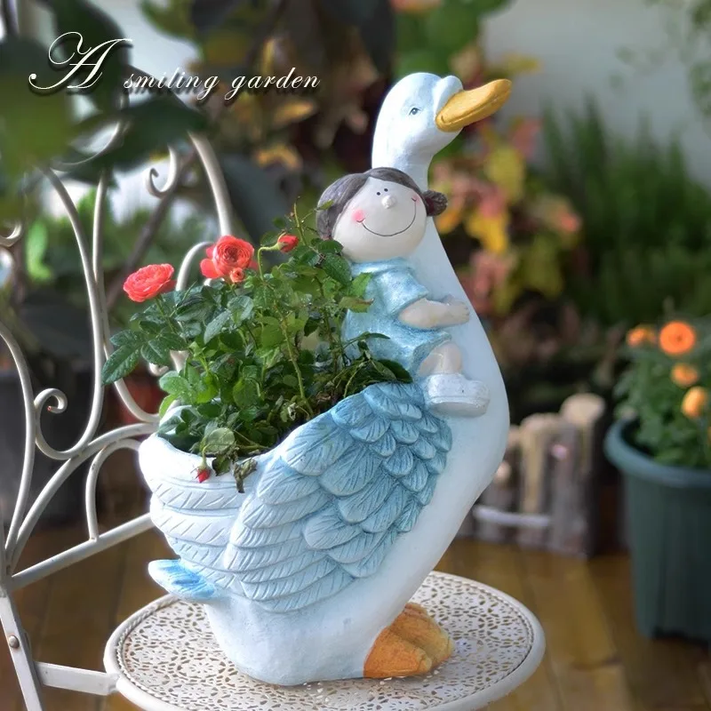 New creative animal flower pot cartoon doll riding swan flower pot container outdoor garden balcony decoration ornament