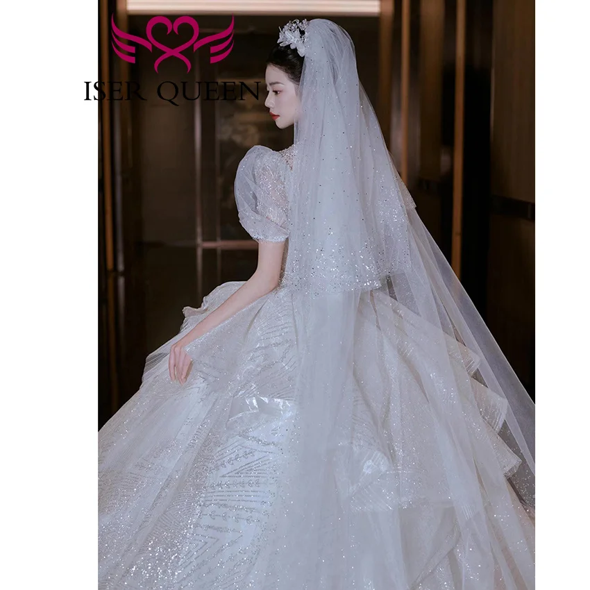 カスタマイズされたクリスタルビーズレースアップリケウェディングドレスボールガウン2025新作高品質シャイニーチュールボールガウンブライダルドレスWX0471