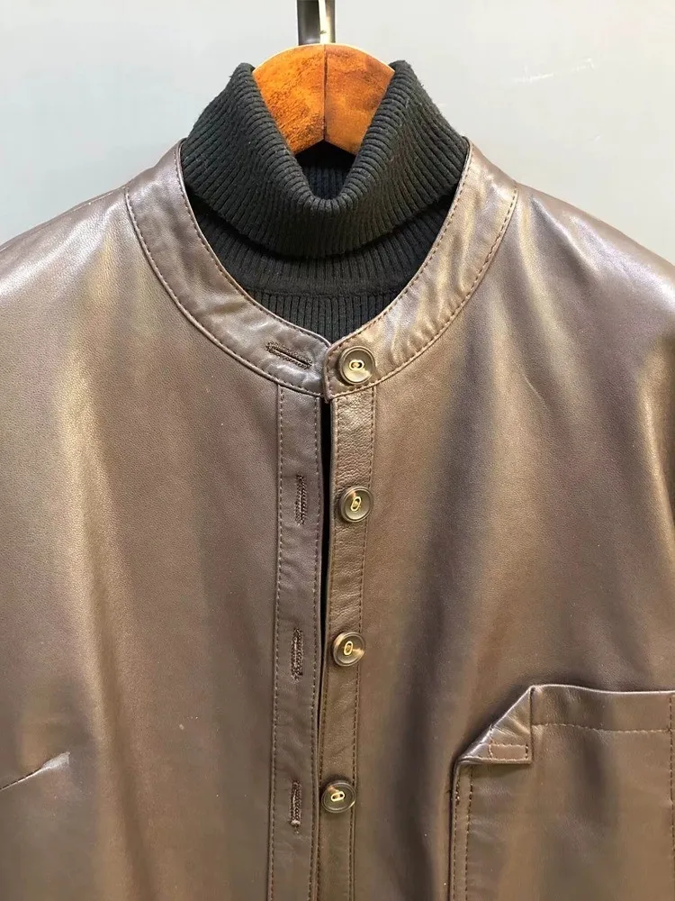 سترة منفوخة بلون سادة من الجلد الطبيعي على الطراز الكوري فضفاضة وجيب واحد الصدر وأكمام طويلة من جلد الغنم ملابس خارجية للسيدات