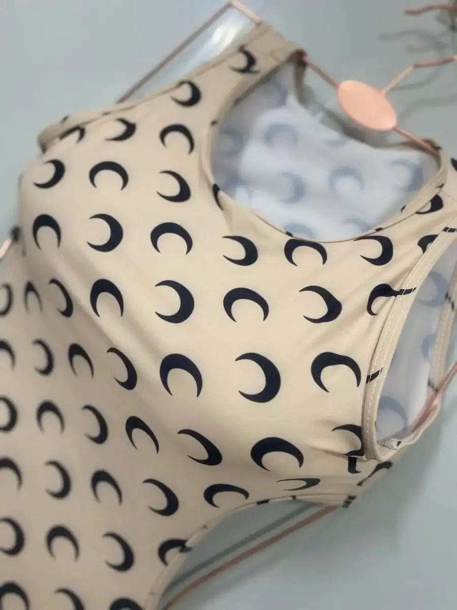 ملابس سباحة نسائية بأكمام طويلة قطعة واحدة مثيرة على الطراز الكوري مطبوعة على شكل قمر بدون ظهر للحماية من الشمس ملابس شاطئ ربيعية ساخنة بدلة استحمام