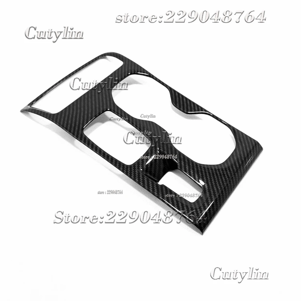 Panel de moldura interior de fibra de carbono negro con acabado brillante elegante y recortes precisos para los controles para Volvo XC40 2019-2021