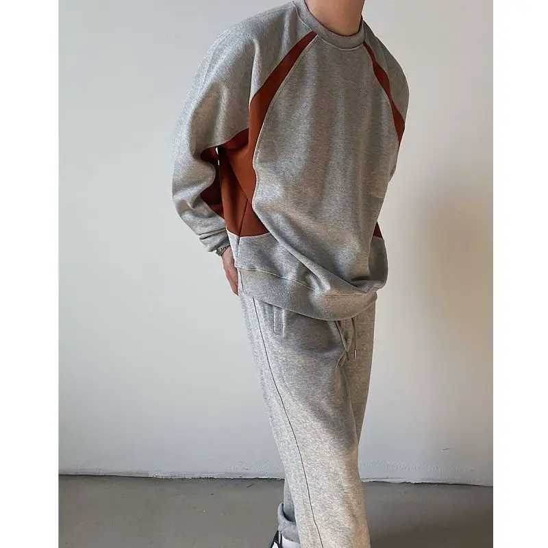 

Large size men's contrasting color splicing niche design sweatshirt trendy casual loose new top for men