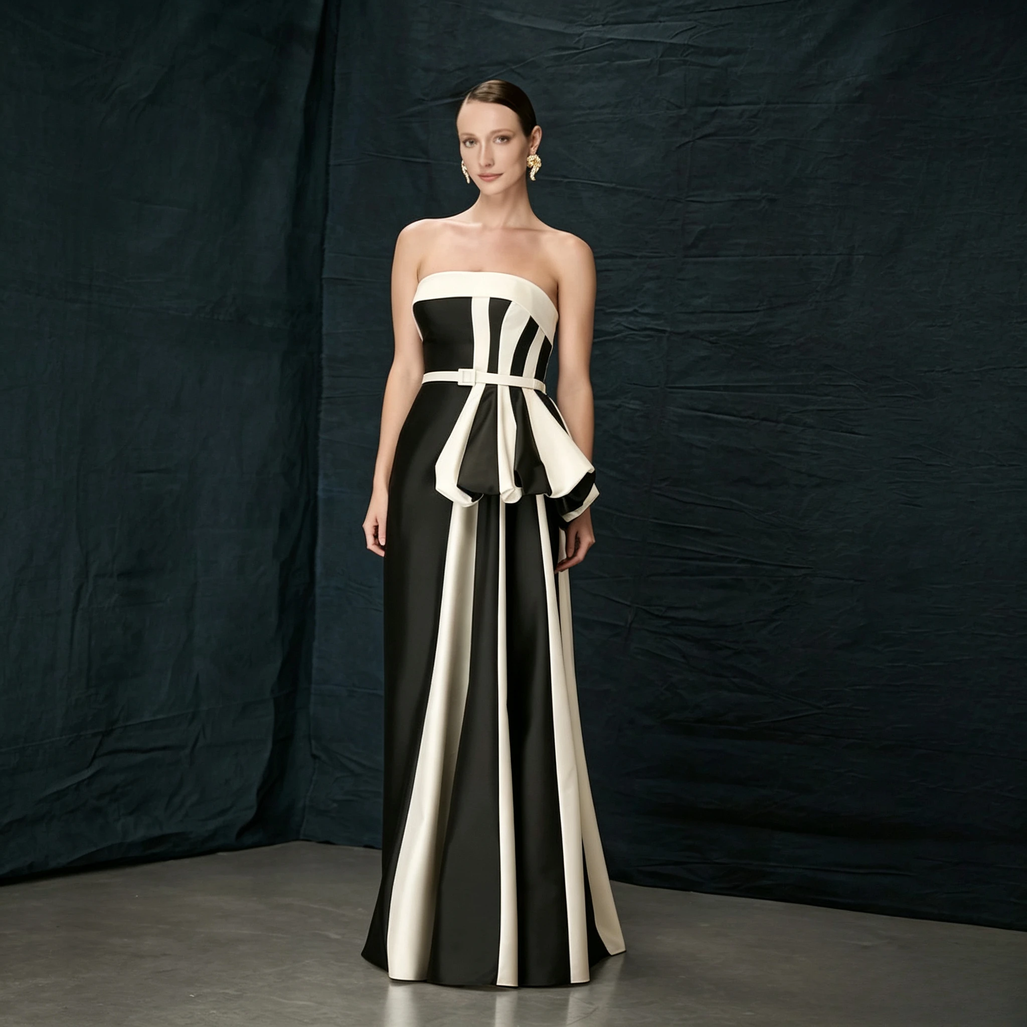 

Black and White Formal Evening Dress with Strapless Neckline, Color Block Paneling Structured Peplum Detail and Floor-Length