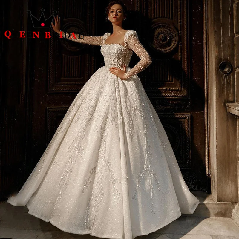 

Elegant Lace Pearls Sequined Wedding Dresses Long Sleeve Sweetheart Backless Bridal Ball Gowns Robe De Mariée Custom Y21X