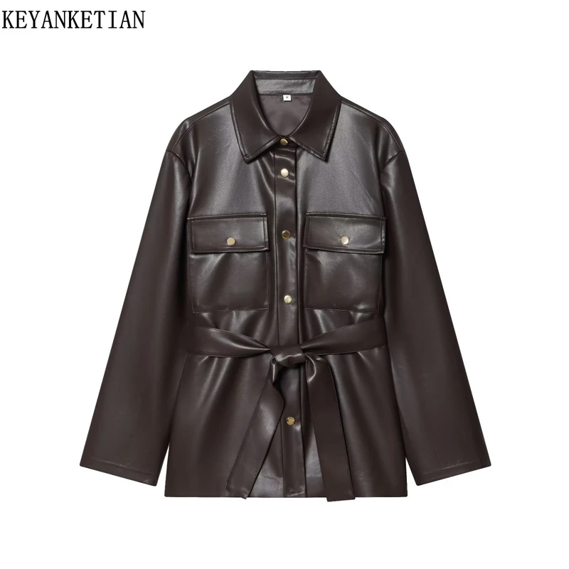 

KEYANKETIAN 2025 Winter New Women's Dark Brown Faux Leather Jacket Unisex style Turn Down Collar Single Breasted With Belt Coat