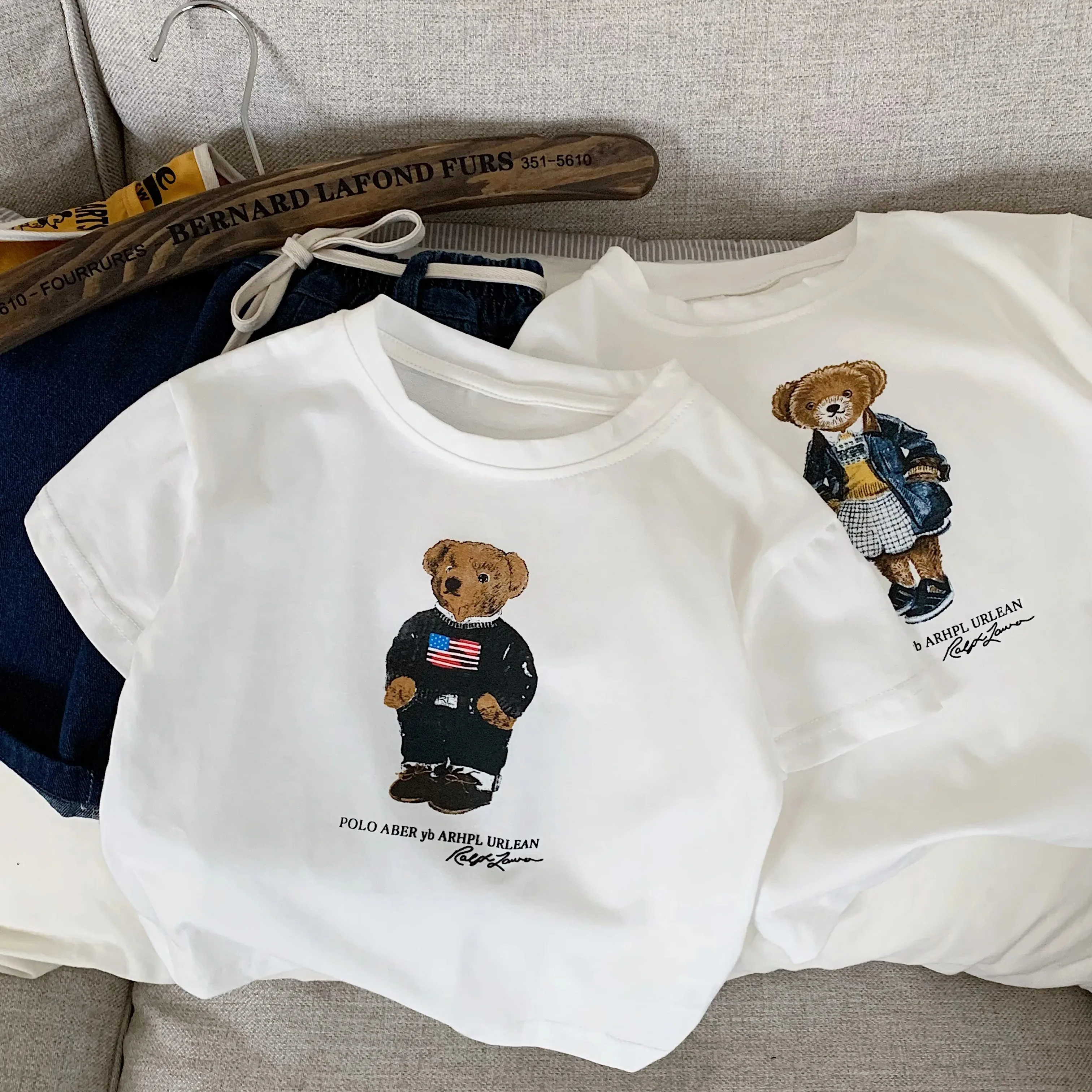 Baby Products Ads - เสื้อยืดเด็กปี 2026 ลายการ์ตูนหมีเท็ดดี้ แขนสั้น น่ารัก สำหรับเด็กชายและเด็กหญิง