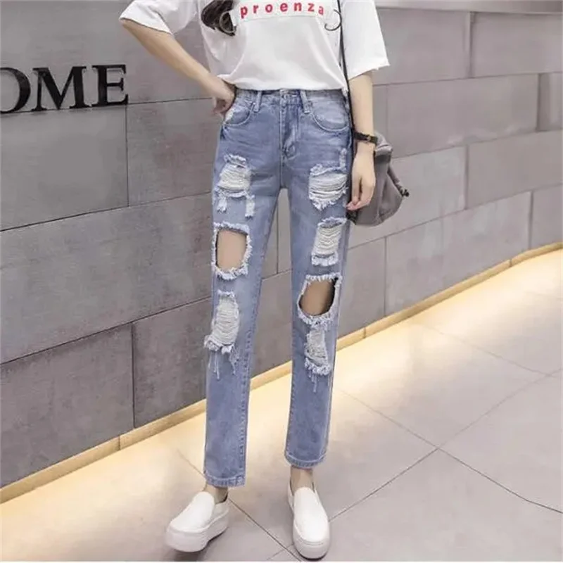 

Летние женские джинсы с высокой талией и дырками, корейские женские однотонные рваные джинсовые брюки большого размера, женские свободные ковбойские брюки
