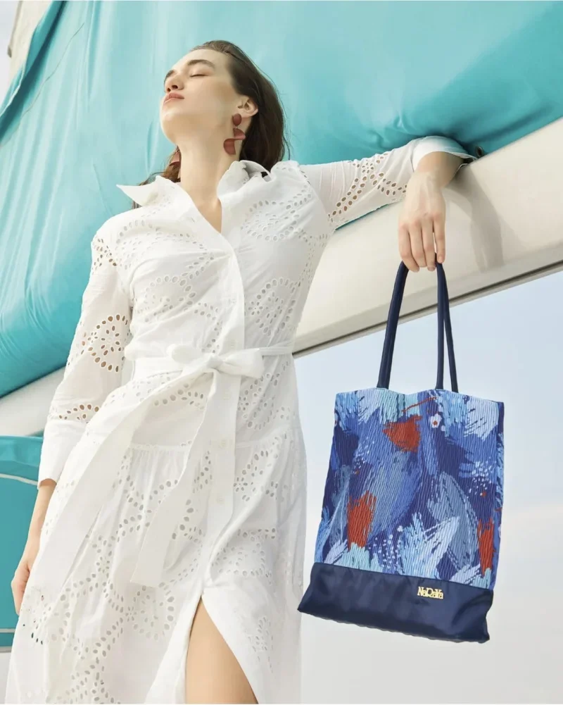 Pop Frühjahr/Sommer Neuer Damen-Rock im eleganten Urlaubsstil aus weißer Baumwolle in A-Linie mit Cut-out und besticktem Gürtel