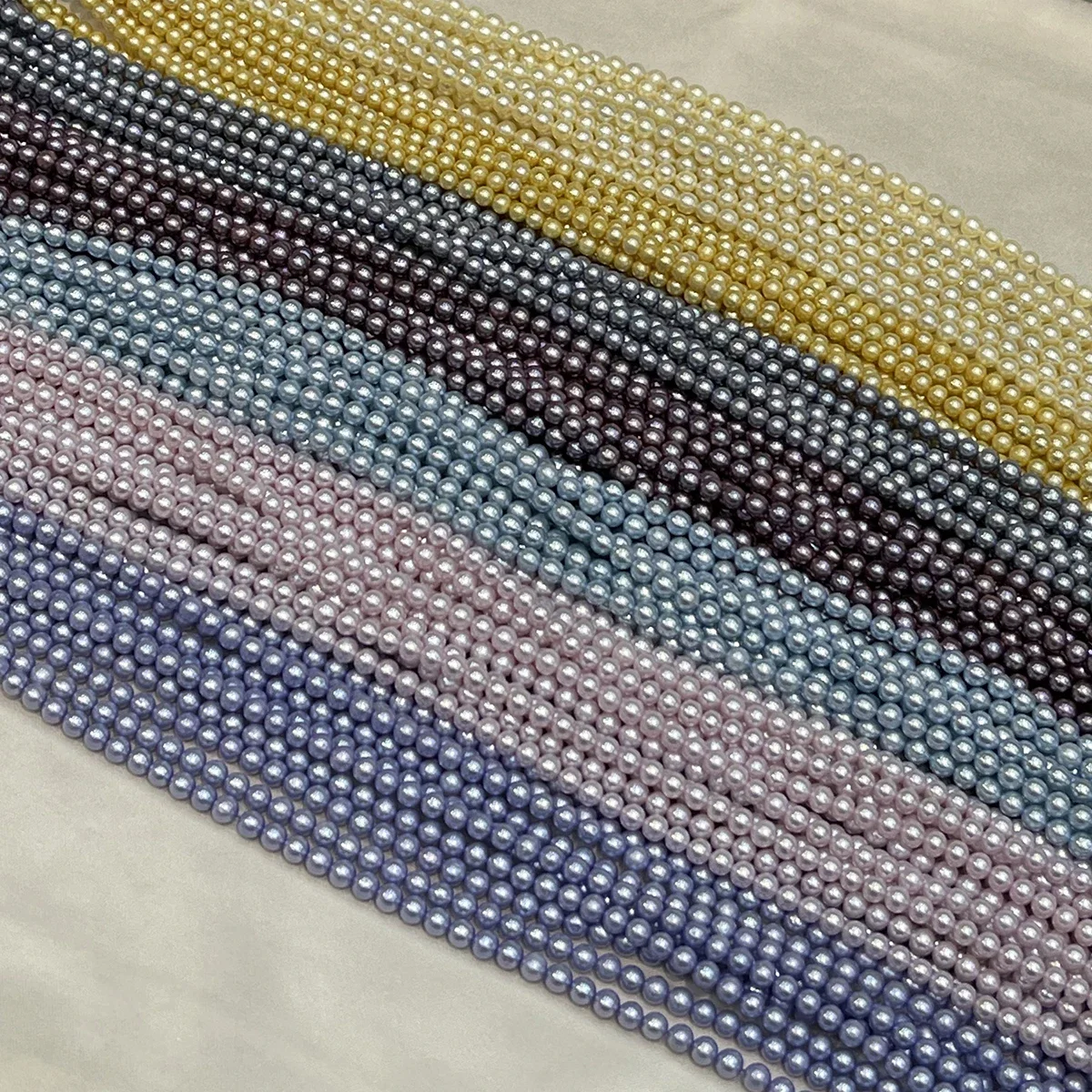 Glänzende, nahezu runde, gefärbte Süßwasserperlen, 4–5 mm, Bastelmaterial für die Herstellung von Halsketten, Armbändern, Ohrringen und Schmuck im DIY-Stil. – Detail 1