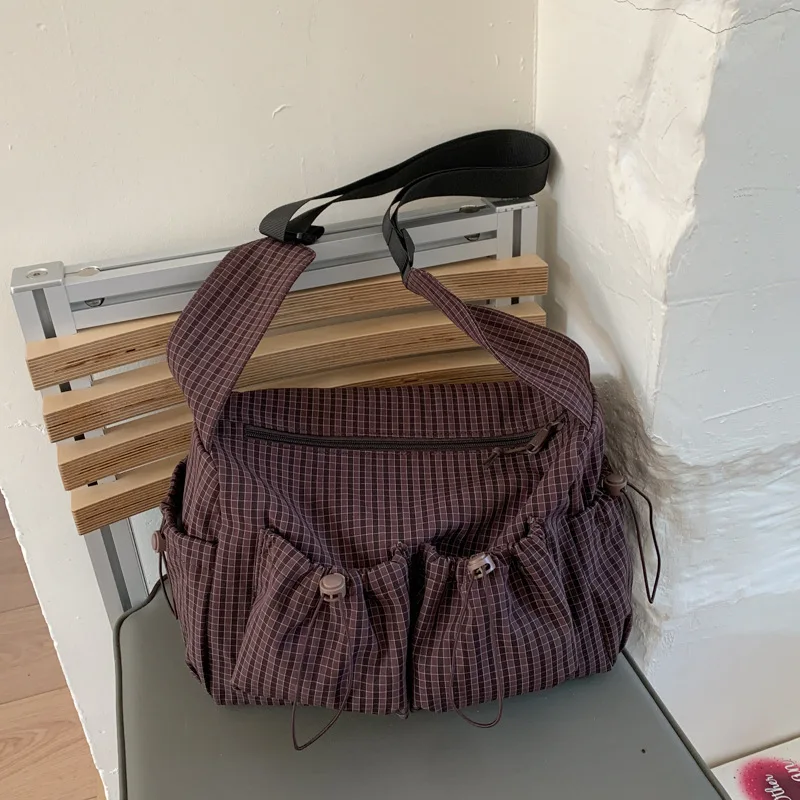 

Женские сумки кросс-боди 2025: Новая сумка-тоут в клетку, на плечо, большая вместимость, легкая, со шнурком, складная, текстурная, простая сумка-подушка