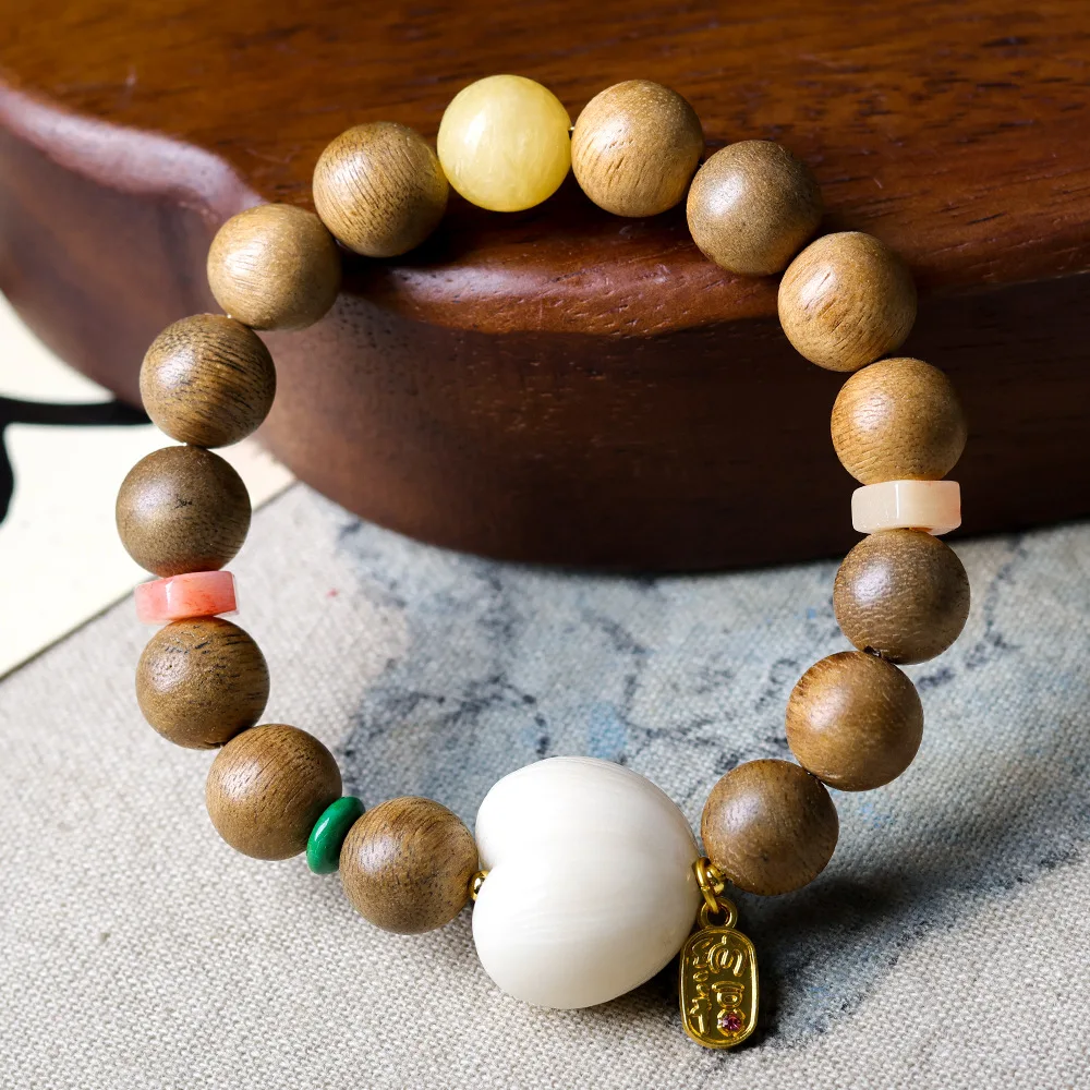 

Original Design Huangqi Nan Agarwood Bracelet with Ivory Nut Peach & Ox Bone Accessories for Women Gifts