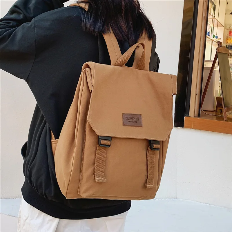 Canvas Schoolbag for Women Large Capacity Backpack 2026 New Fashion Flip‑Top Buckle Design Laptop Backpack College Junior High S