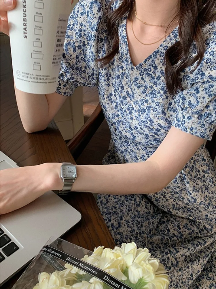 تنورة نسائية طويلة بطبعة زهور وخصر مرتفع وتصميم فقاعي وياقة على شكل V وقصة A-line للصيف