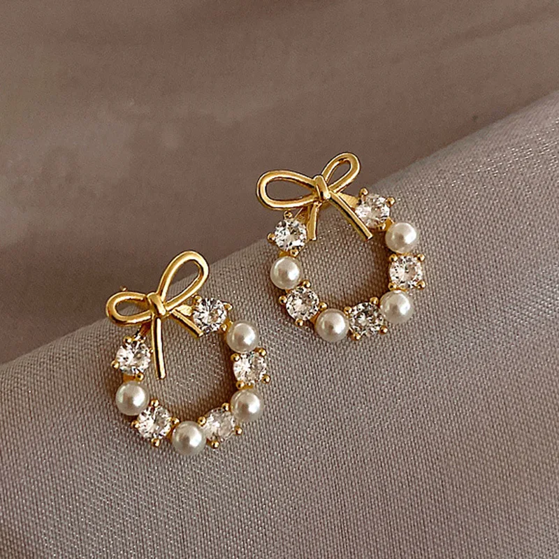 Hollow Out Round Rhinestones Bow Stud Earrings for Women Temperament Fashion Imitation Pearl Ear Studs Party Wedding Jewely K1 Image 6