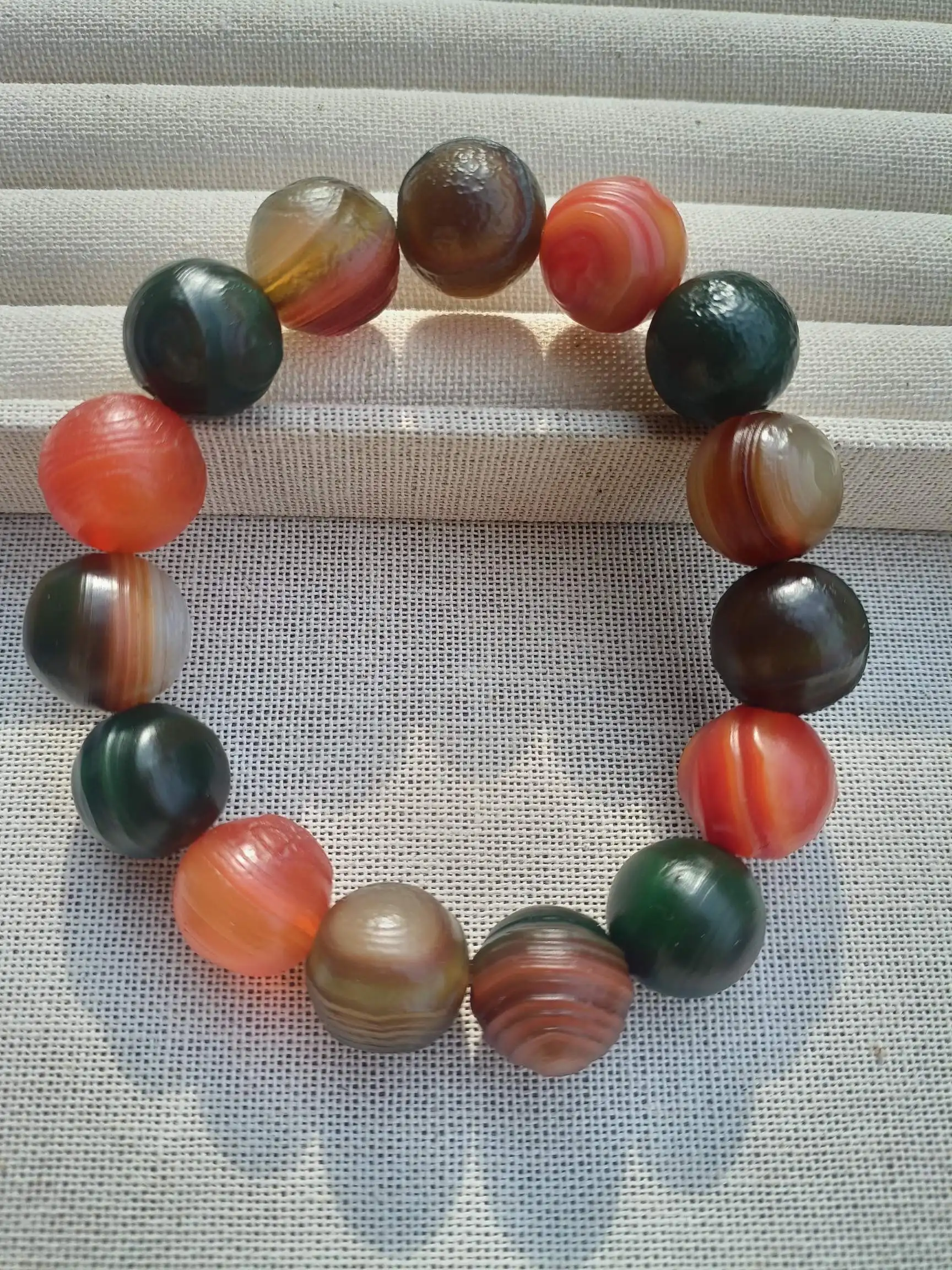 

A fine Alxa agate round bead bracelet for men and women, symbolizing a winner in life, is a perfect gift for family and friends