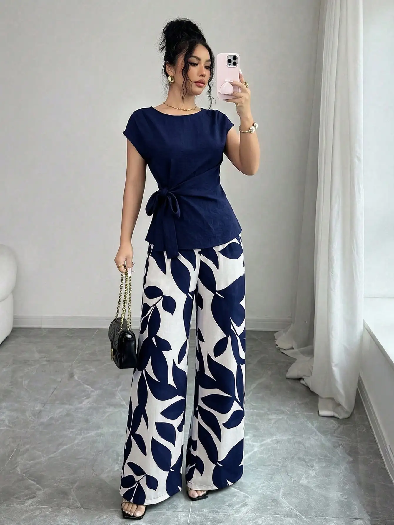 Elenzga Women's Spring/Summer Elegant Commuter Wine Red Pleated Waist Cinched Bow Tie + Women's Spring/Summer Elegant Commuter Casual Wine Red Leaf Print Waist Cinched Double Pocket Design Loose Slightly Wide Leg Long Pants