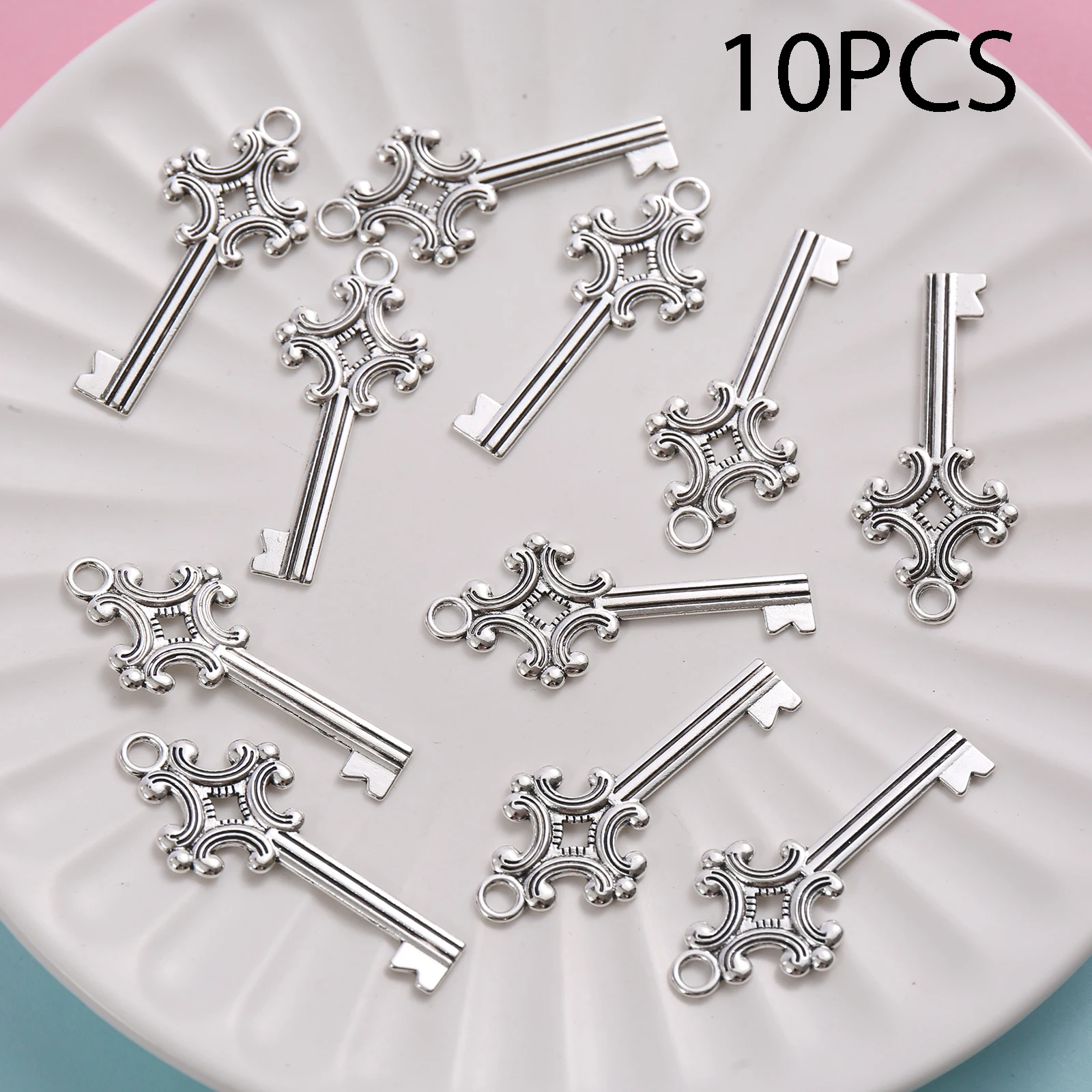 10 Pieces of Vintage-Style European Pattern Key Pendants with a Single Hole, Featuring Retro Key Pattern Designs, with a Hanging Loop at the Top, Suitable for DIY Bracelets, Earrings, Necklaces, and Niche Handmade Beading Accessories