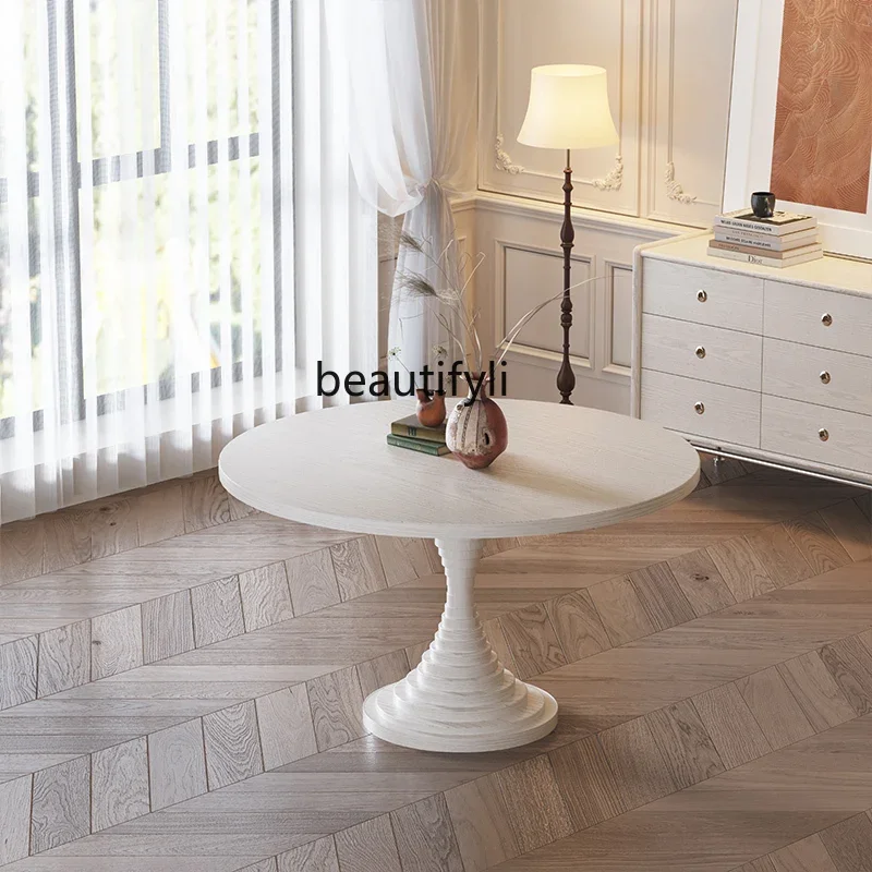 

Light luxury creamy solid wood dining table and chairs for home use French retro round table living room dining table furniture