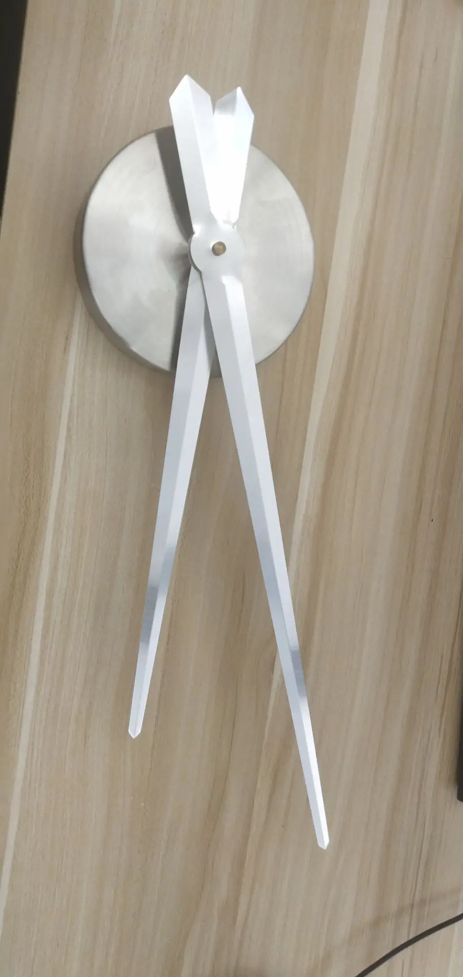 A set of large wall clock accessories including pointers, movements, and clocks