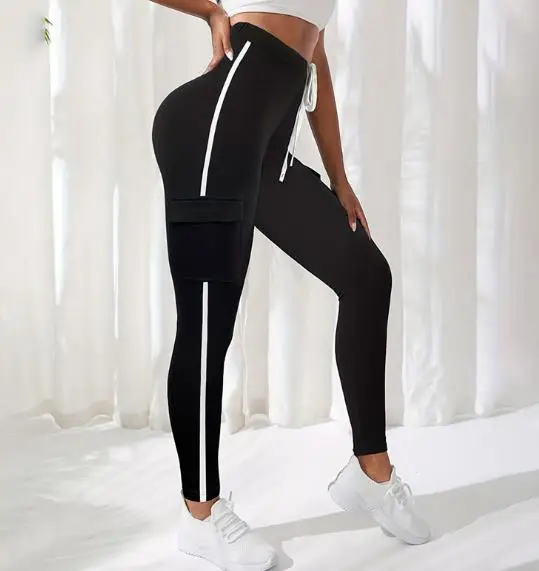 Pantalon de sport serré taille haute pour femmes, poches à la mode et à la mode, pantalon serré de neuf pouces, blocage de couleur