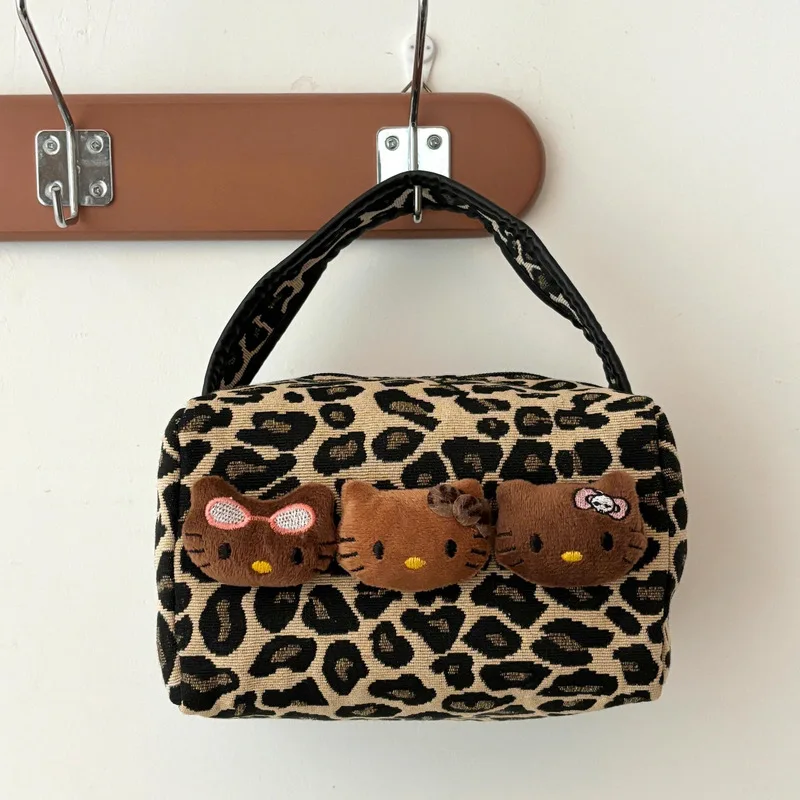 Bolsa de maquiagem de couro preto leopardo hello kitty para mulheres, grande capacidade, portátil, viagem, cuidados com a pele e cosméticos ﻿