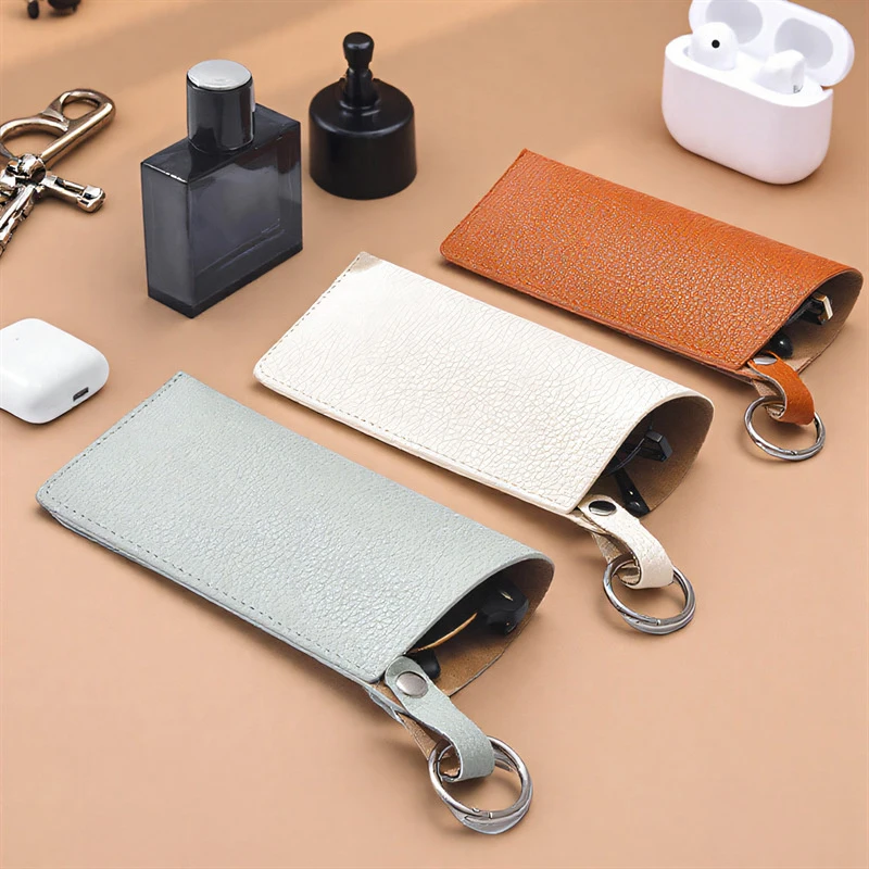 Estuche de lujo para gafas de mujer, estuches de bolsillo con soporte suave de cuero, bolsa de viaje delgada, llavero para gafas de sol