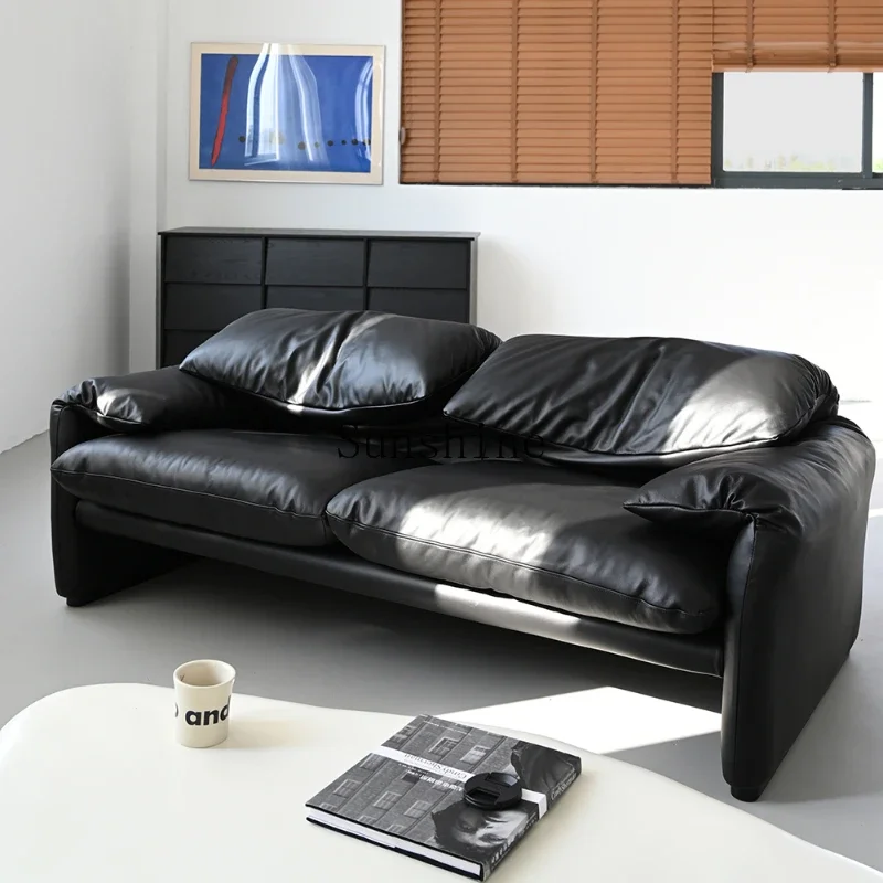 

Italian retro black leather high backrest foldable ear sofa