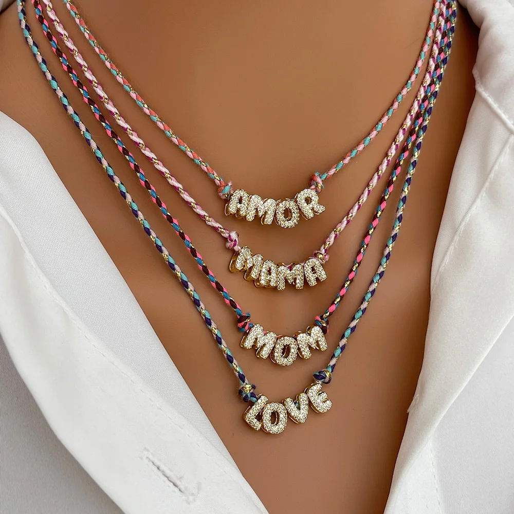 ZAKOL Luxury Zirconia Mom Love Mama Initial Letter Pendant Necklaces Colorful Weave Rope Necklace for Mother's Day Gifts