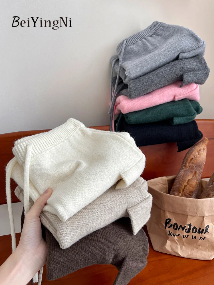 Beiyingni nova moda de malha cintura elástica mini saia feminina coreano bolsos lápis saias curtas senhora simples inverno magro jupes