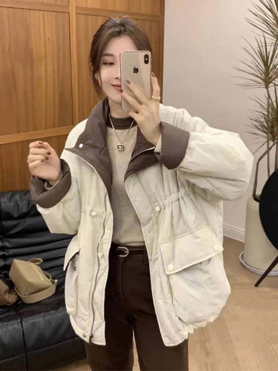 

Корейская зимняя куртка-пуховик 2023 года с цветными блоками, утягивающая талию, с воротником-стойкой, свободного кроя, с большими карманами, для женщин