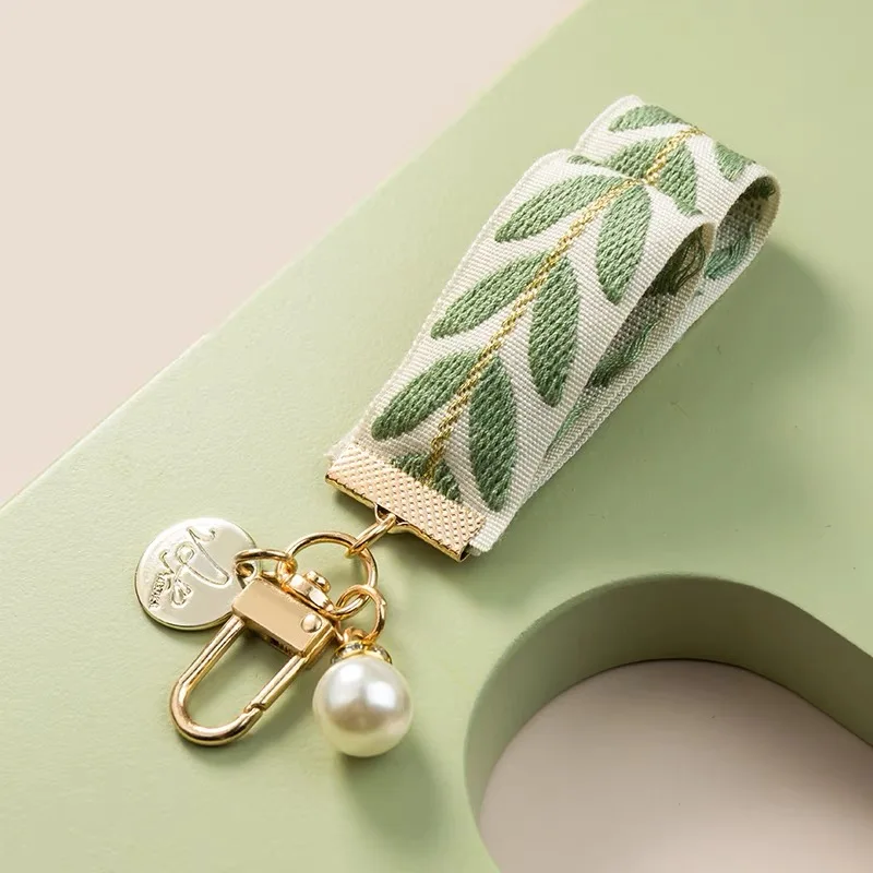 Kwaii White Pearl Beaded Keychain Creative Leaf Ribbon Bracelet Key Ring for Women Girls Car Handbag Phone Case Pendent Gifts