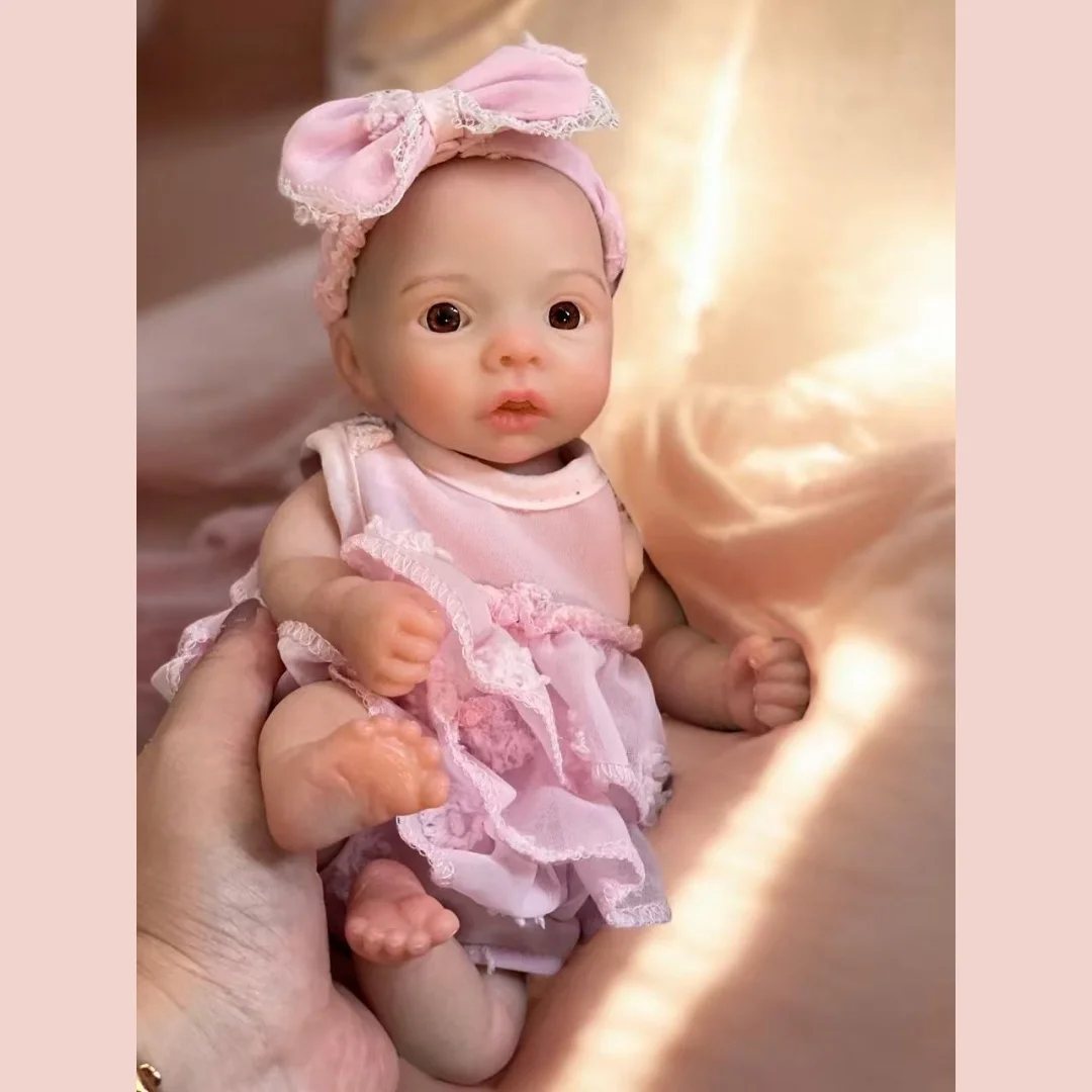 ตุ๊กตาซิลิโคนรีบอร์นเด็กผู้หญิง ขนาด 10 นิ้ว/25 ซม. ปากเปิด ล้างทำความสะอาดได้ ทั้งตัว ทำจากซิลิโคน ผิวทาสี 3 มิติ เหมือนจริง พร้อมชุดสีชมพู