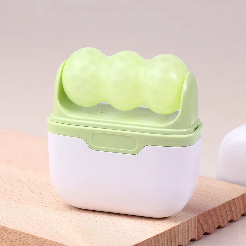 Rouleau de glace pour le visage à Double tête, utilisé pour le massage du visage et de la tête, en matériau en résine, sans parfum ni batterie
