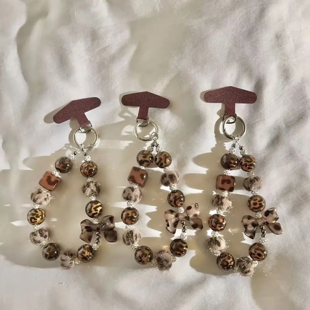 

Anti-Lost Leopard Print Phone Charm with Plush Ball Simple Beaded Mobile Phone Charm Universal Chic Mobile Phone Lanyard