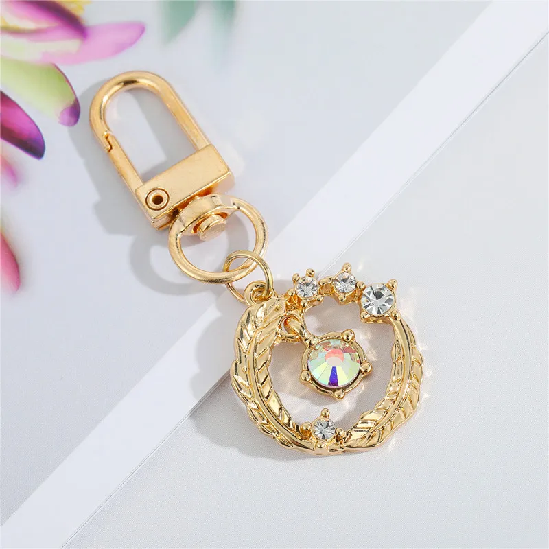 Image 5: Porte Clef Arc-en-Ciel Mauvais Œil Bleu pour Amis ou Amoureux, Accessoire Maléfique, Main de Fatima, Bling pour Sac, Airpods, Voiture, 1 Pièce
