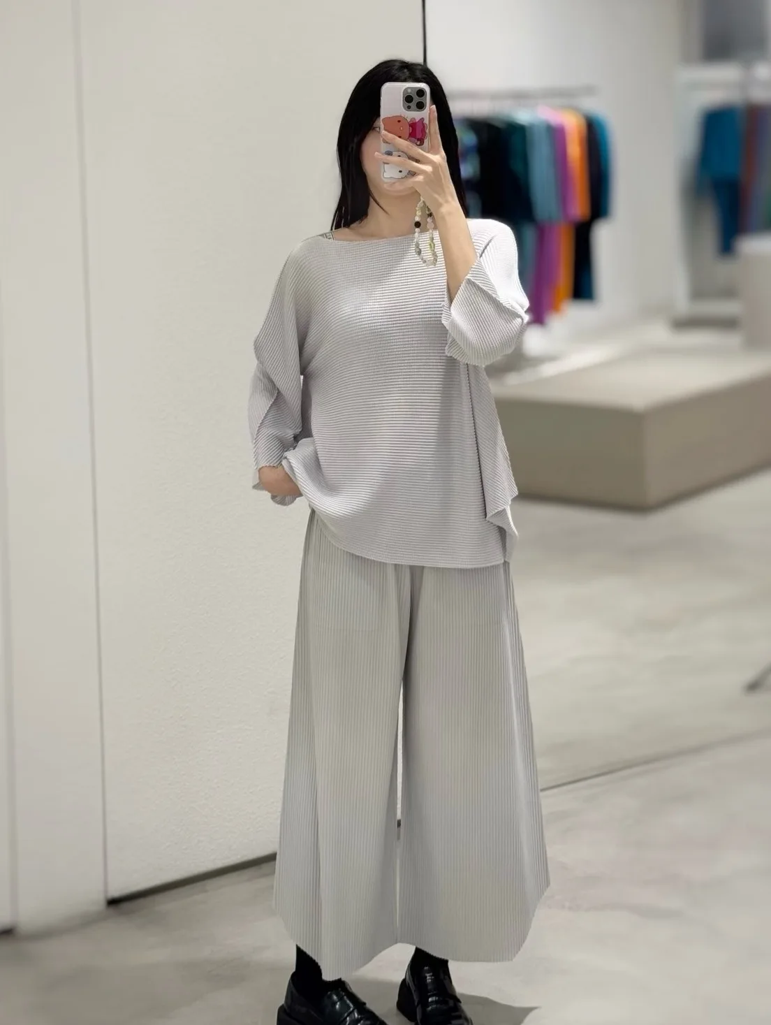 YUDX Miyake Pleated Knit Pullover with Relaxed Fit, Round Neckline, Textured Fabric and Soft Colors for Minimalist Modern Style
