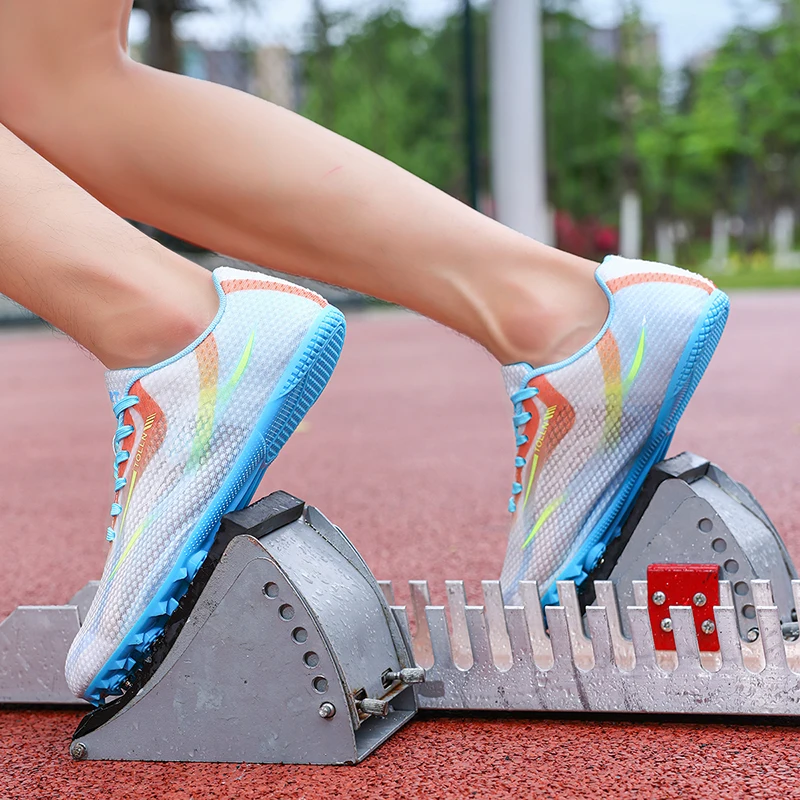 Men Women Nail Shoes Professional Track and Field Shoes Non-slip Spikes Sneakers Youth Sprint Sneakers Breathable Athletic Shoes