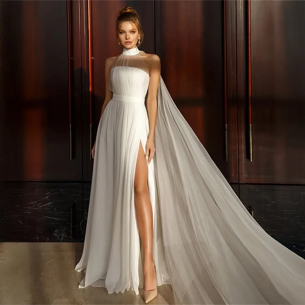

Customized High Neck Bridal Dress Chiffon Wedding Dress with Dramatic Tulle Cape and Side Slit for Fashion-Forward Brides