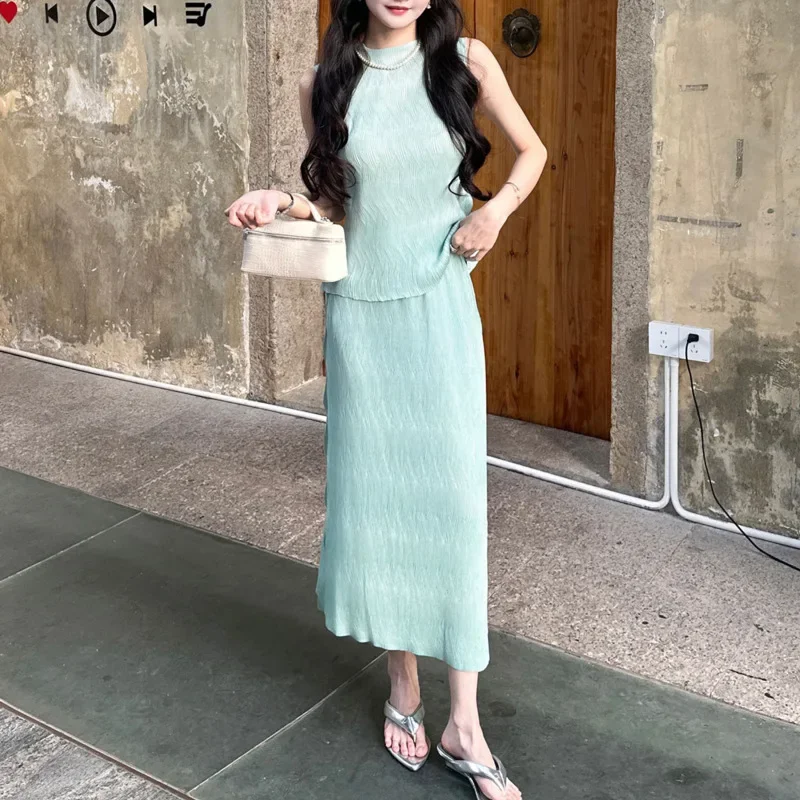 

2025 Summer New Wave Miyake Solid Colour Folded Two Piece Women's Sleeveless Slim Top + Fashion A-line Skirt Two Piece Set