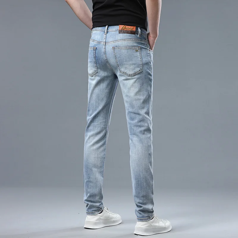 Pantalones vaqueros sencillos de color azul puro para hombre, pantalones elásticos ajustados, suaves y cómodos, de alta gama y a la moda para oficina, novedad de verano 2024