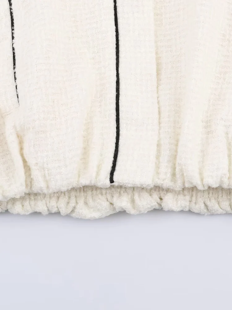 Nowy modny damski płaszcz w stylu europejskim i amerykańskim, luźny, z blokami kolorów, stójką i długimi rękawami.