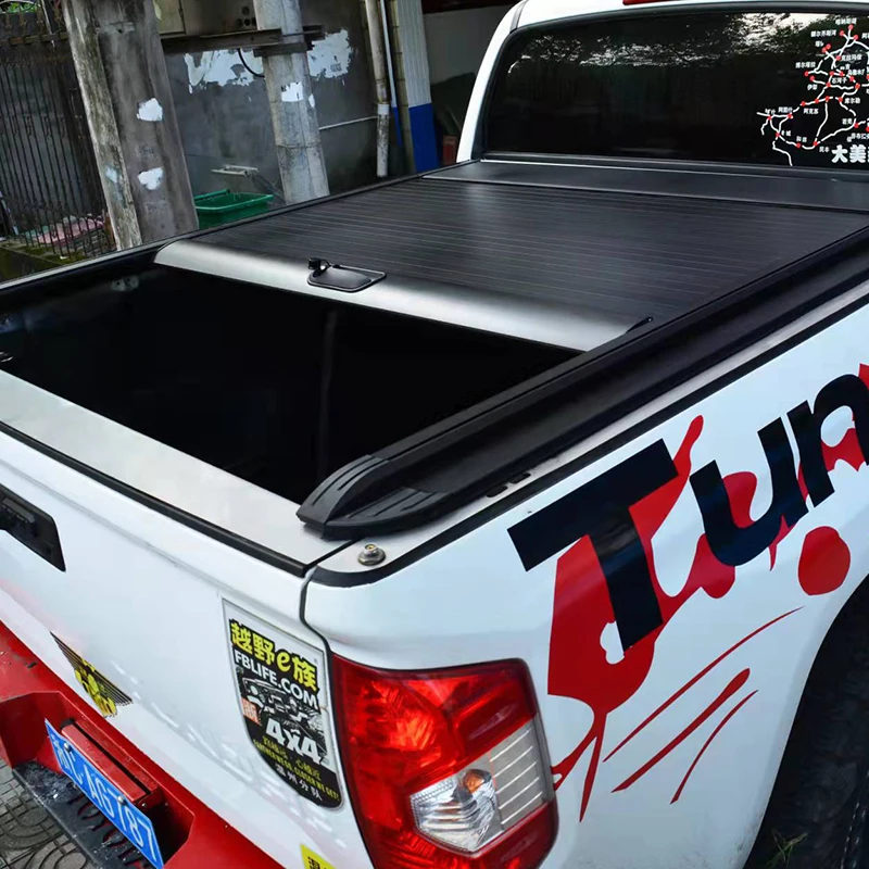 Pickup truck bed cover for Tundra