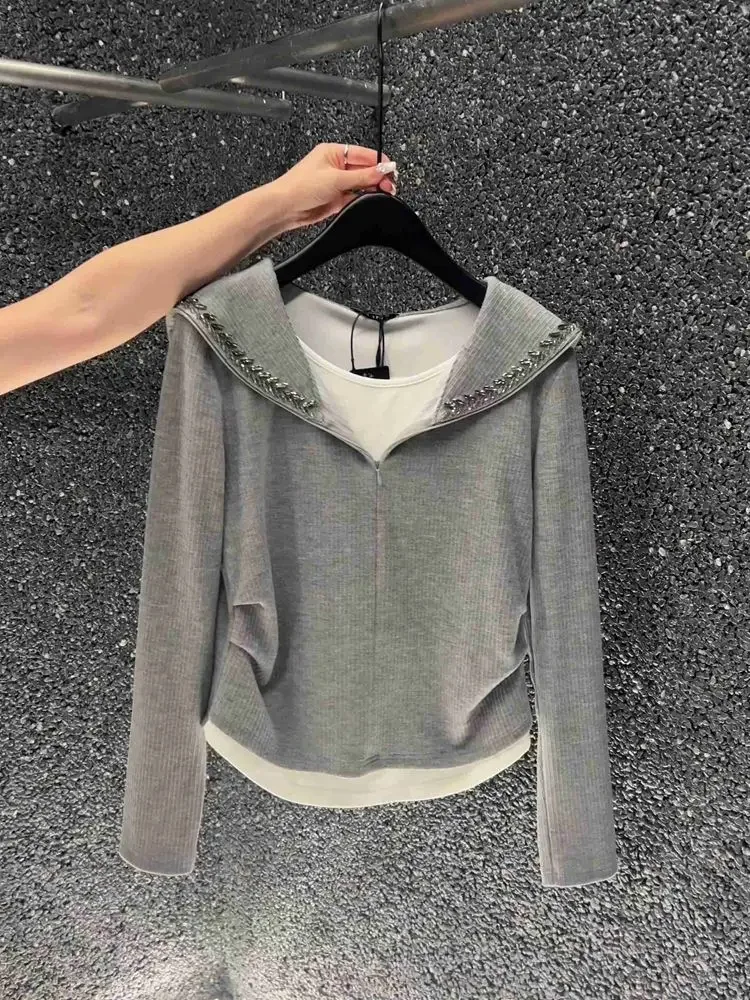 Fake two-piece blouse female autumn 2024 new rhinestone pleated fashion Joker long-sleeved niche design loose slim sweater.