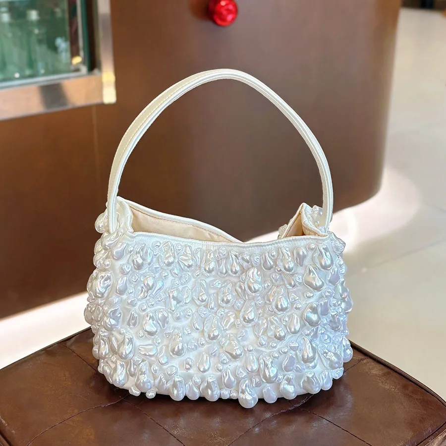 Fashion pure white fresh pearl beaded handwoven bag simple and generous temperament niche cheongsam portable underarm bag