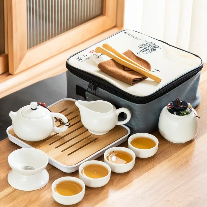 Portable travel outdoor boxed set of Chinese tea sets for martial arts. Ceramic tea ware. One pot and four cups set.