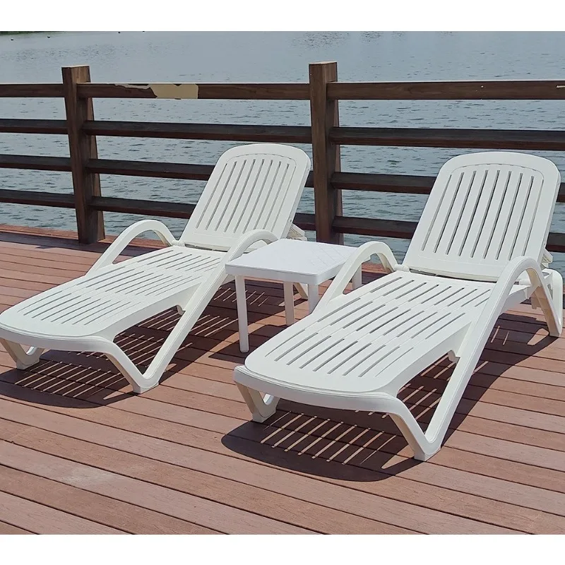 Villa garden sofa, patio deck chair, outdoor plastic beach chair in swimming pool, hot spring hotel swimming pool leisure