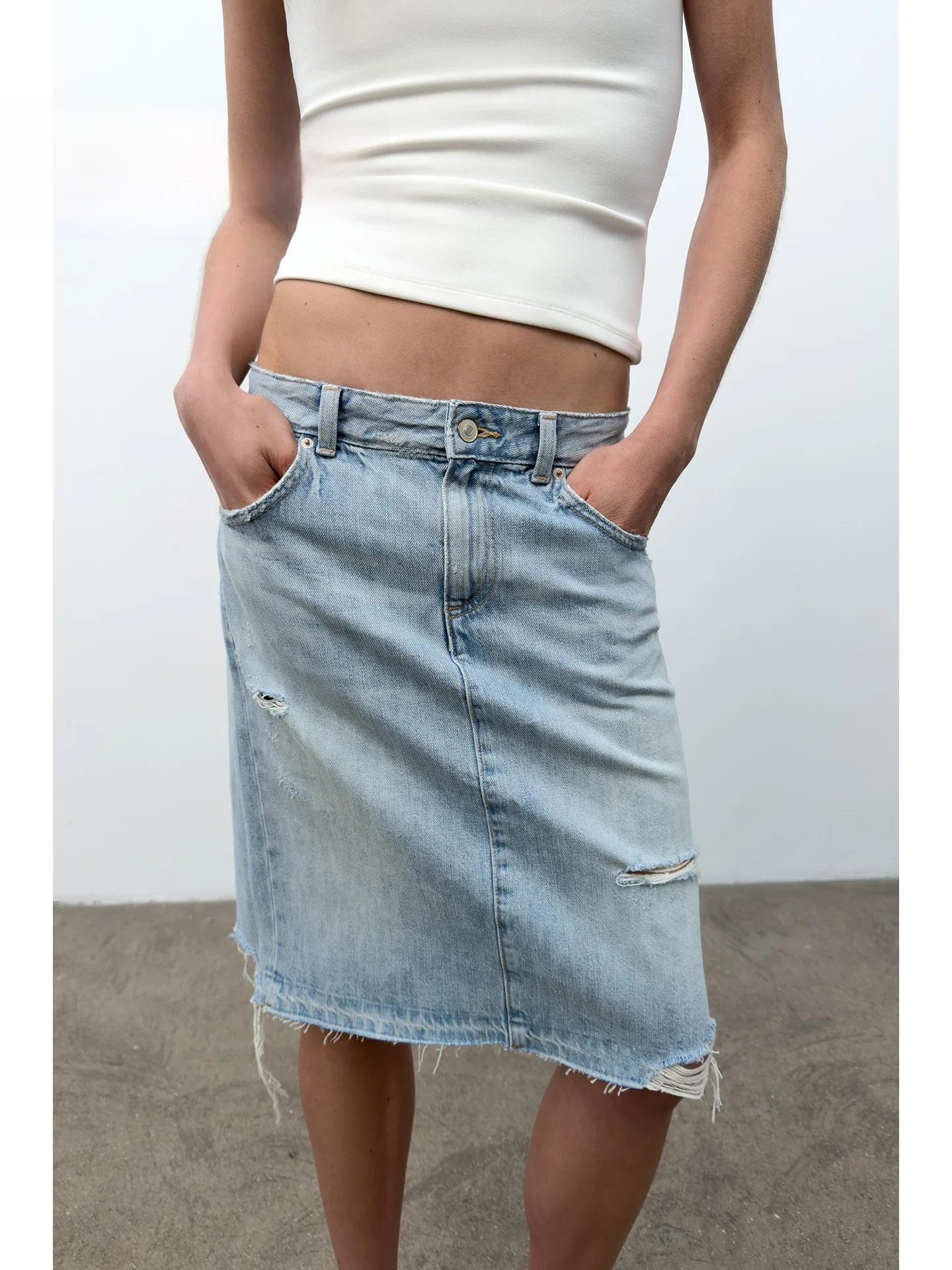 Summer 2026 Mid-Waist Distressed Denim Skirt with Frayed Hemline And Decorative Holes A-line Straight Cut Ladies' Skirt